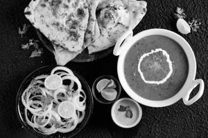 1 Egg Tadka + 1 Butter Naan (1 Pc)                                                                                    