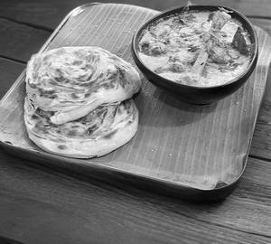 Parotha With Aatu Kaalu Pepper Masala [2 Pieces]