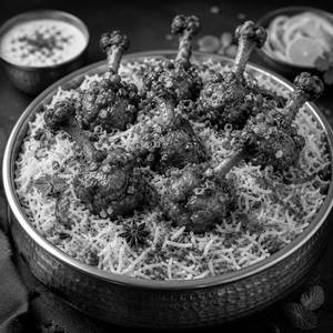 Saffron Hyderabadi Chicken Lollipop Dum Biryani