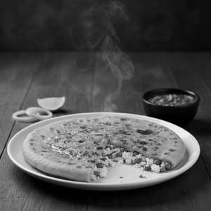 Stuffed Paneer Kulcha (1 Pc.)