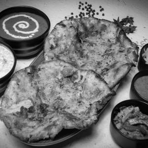 2 Chur Chur Naan + Dal Makhni + Raita + Salad
