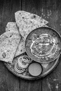 2 Butter Naan + Paneer Butter Masala