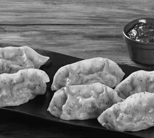 Exoctic Veg Momos [8 Pieces]