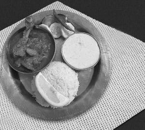 Rice with chicken gravy and kheer