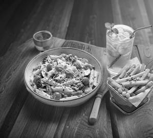 Creamy Veg White Sauce Pasta With Fries And Iced Tea