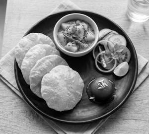 Luchi with sada Aloo torkari ( Full )