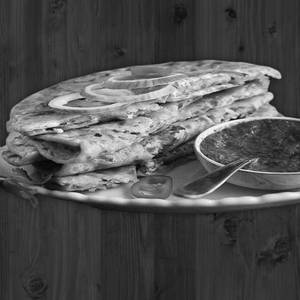 Paneer pyaz paratha [1 piece] with curd and pickle