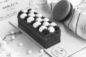 Swiss Black & White Medovik With Macaron