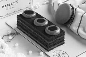 Sparkling Dark Chocolate Medovik With Macaron