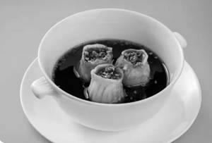Chicken Dumplings In Hot Garlic Sauce  [Serves 2]