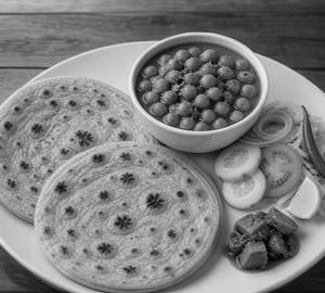 Chola + 2 Plain Paratha + Salad + Aachaar