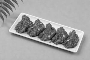 Chicken Pan Fried Momo in Chilli Garlic