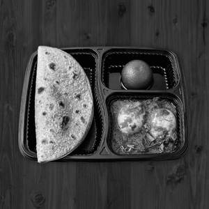 Egg Curry And Roti Combo
