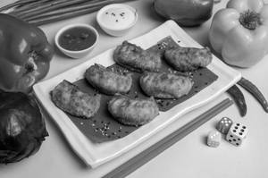 Chicken Afgani Momos (8 Pieces)