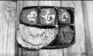 Non Veg Thali [Chicken dum biryani + boneless chicken gravy + tandoori roti (2) + special raita]