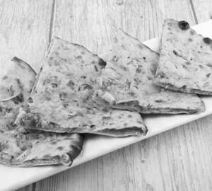 Tandoori Onion Stuffed Paratha With Dal Makhani And Curd