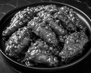 Schezwan Chicken Wings 5pcs