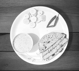 Kheere Ka Rayata And  4 Butter Roti + Salad