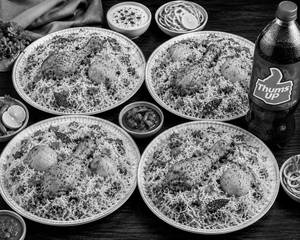 Chicken Biryani [4 Plates] with Thums Up [1 Litre]