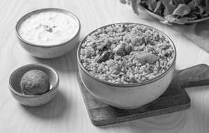 Gongura Chicken Annam Served With Fried Egg & Raitha