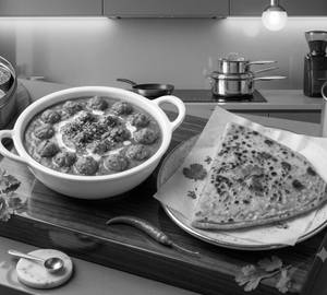Soya butter makhani and ghee tawa paratha combo