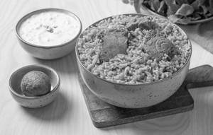 Chepchepala Pulusu Annam  Served With Fried Egg & Raitha