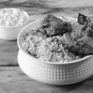 Chicken Tikka Biryani with Thums Up Soft Beverage [250 ml]