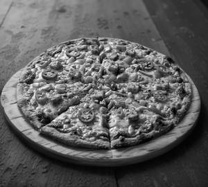 Veggie delight schezwan pizza