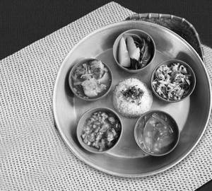 Pork With Axone Thali ( Rice, Dal, Boil Veg, Chutney, Pappad).