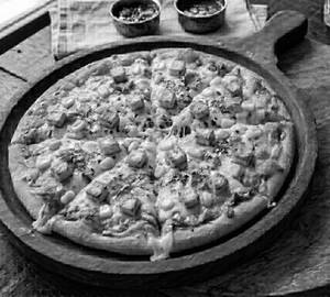 Corn paneer pizza