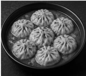 Veg. Jhol Momo (08 Pcs.)