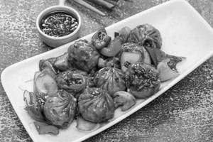 Schezwan Momos [8 Pieces]
