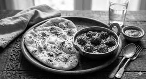 1 Naan Butter + 1 Manchurian Veg                                                                                    