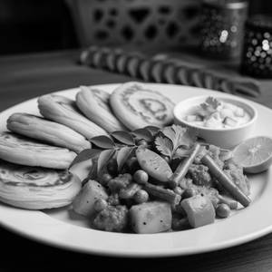 Coin Parotha With Veg Kuruma