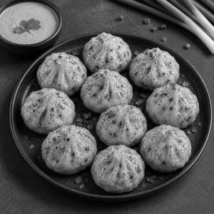 Veg Afghani Momos (10 Pieces)
