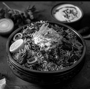 Mutton Biryani With Gravy Or Raita [ Serves 1- 2]