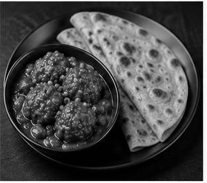 Veg Manchurian(2Pcs) + 2 Paratha