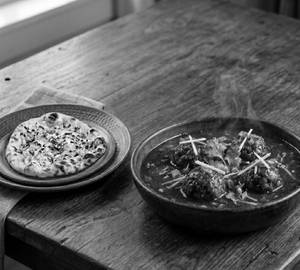 Veg Manchurian Gravy (4 Pcs) + Indian Bread (1 Pc)