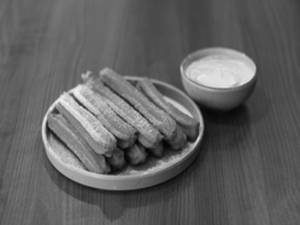 Dipped Red Velvet Churros with White Chocolate