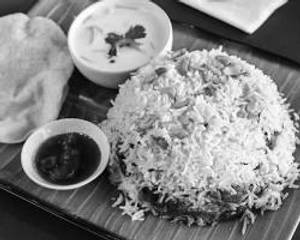 Chicken Dum Biriyani Served With Salad, Rita & Papad