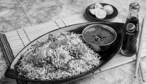 Chicken Biryani With Gravy +  Pepsi 200ml