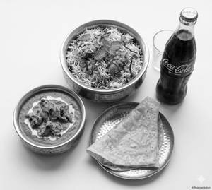 Chicken Biryani + Butter Chicken + Rumali Roti + Soft Drink