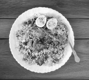 Chicken biryani with egg and aloo