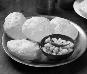 Luchi ( 4 Pcs) With Sada Aloo Torkari And Achar