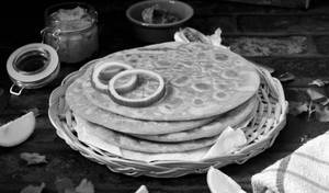 Sattu Paratha ( 2pcs) With Curd , Butter Podina Chatney And Achar