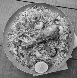 Chicken leg egg biryani