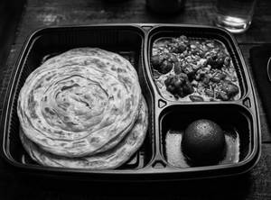 Parota 2 + Veg Manchurian Gravy + Jamun 1