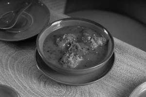 Tandoori Jhol Momos Soup