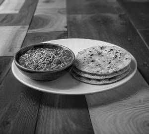 Sev Tamatar Ki Sabzi + Butter Roti [2 Pcs]