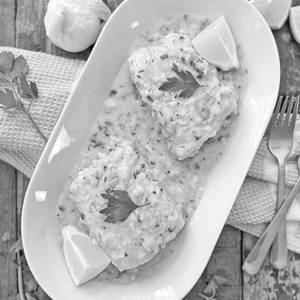 Sliced Fish In White Garlic Sauce